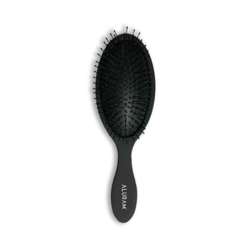 Aluram DETANGLE BRUSH ergonomic hair brush at Pasadena Aveda hair salon