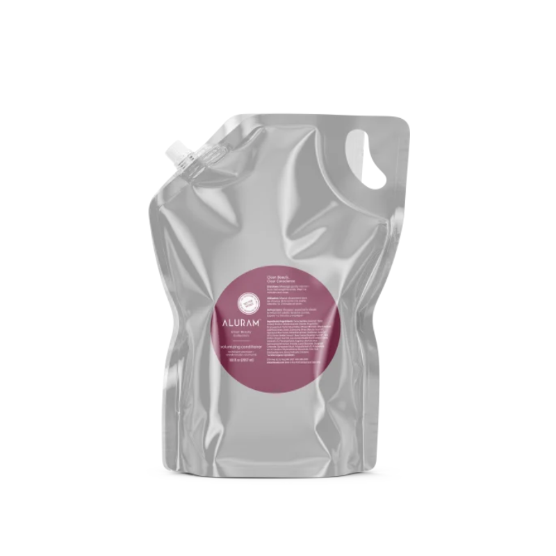 Aluram Volumizing Conditioner close up pump dispenser at Pasadena hair salon